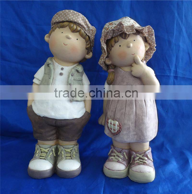 resin garden boy and girl statue