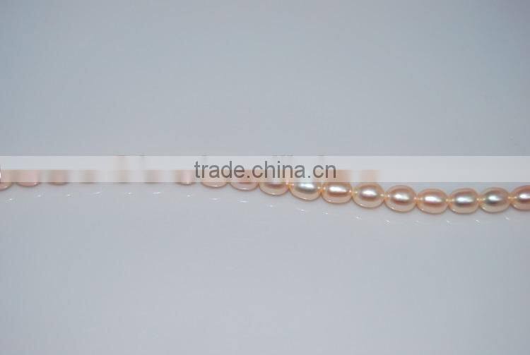 new 8-9mm pink rice shape freshwater pearl strand wholesale