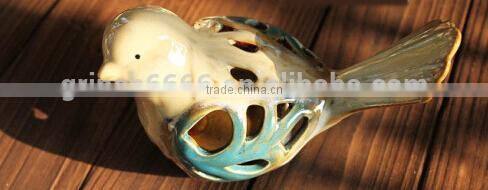 Ceramic bird home decoration with hollowed out shape