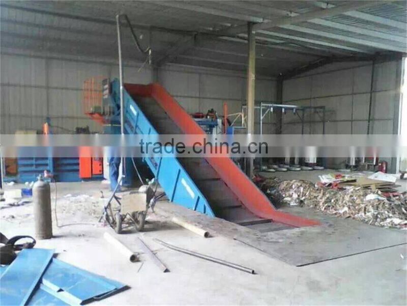 Automatic hydraulic scrap paper baling press
