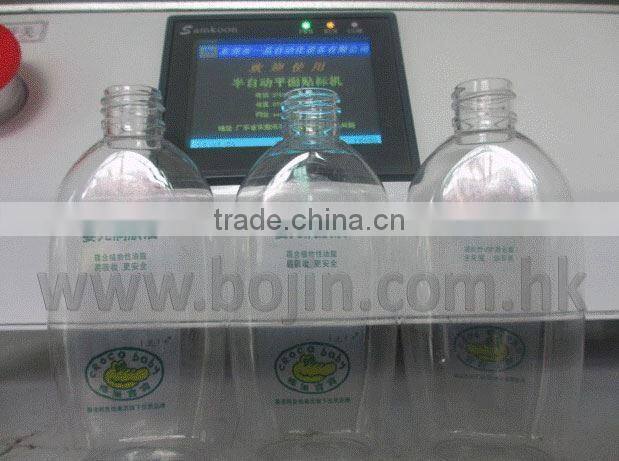 Cheap high quality semi-automatic flat bottle labeling machine for flat bottle