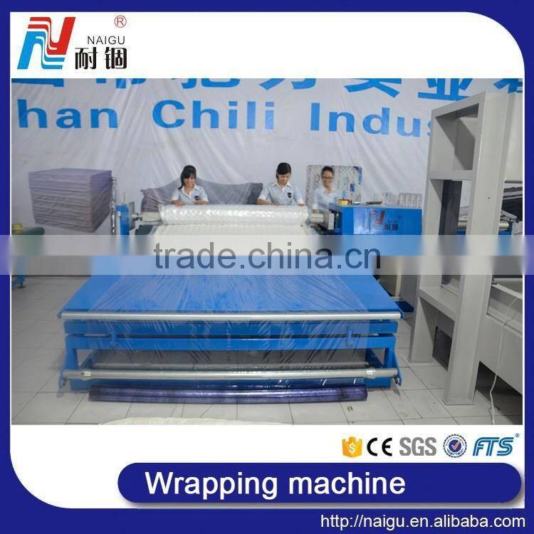 China Foshan factory price latex foam mattress compression machine/mattress roll packing machine