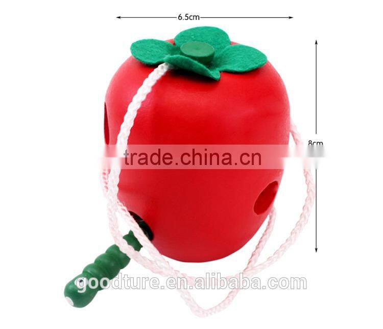 Wooden Caterpillar Eating Red Apple