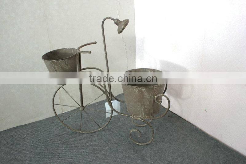 Plant holder with watering pot