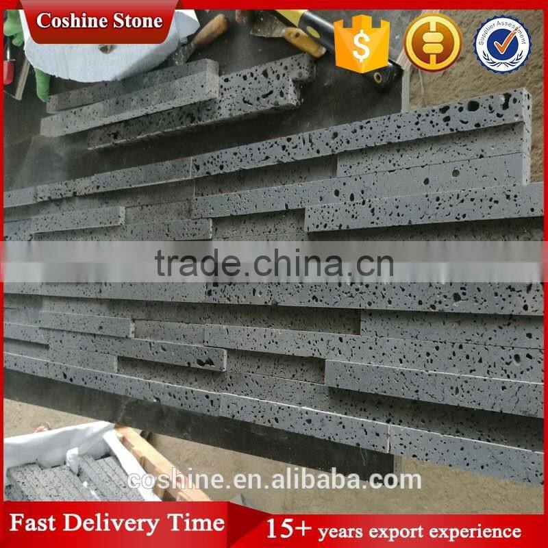 Natural fenestrated black basalt stone