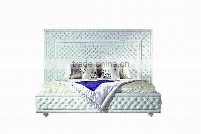 Luxury white leather hotel bed with high headboard