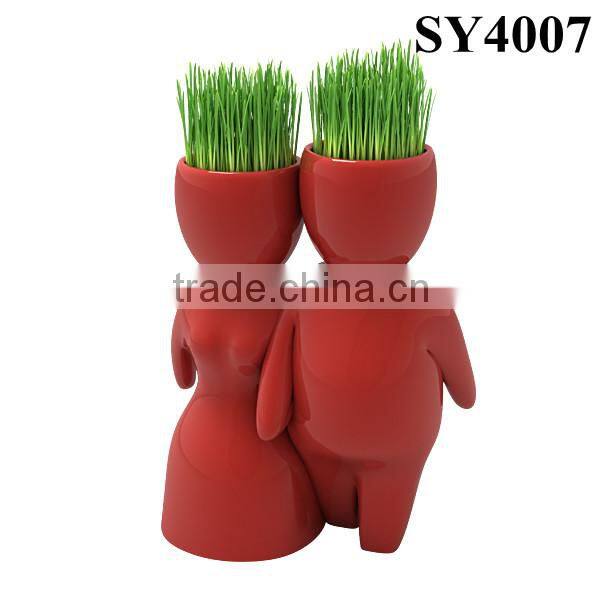 Energy little white man growing grass doll