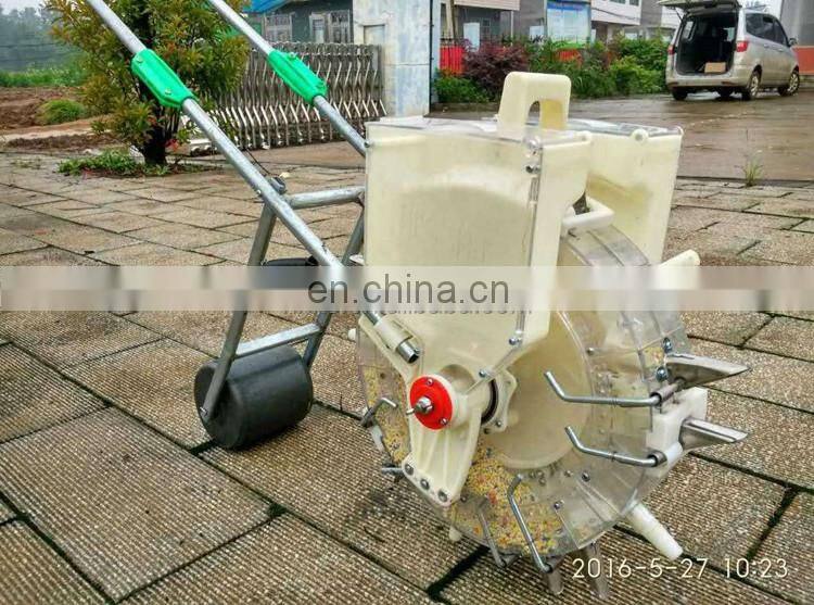 High quality hand push roller corn seed planting machine bean plant machine