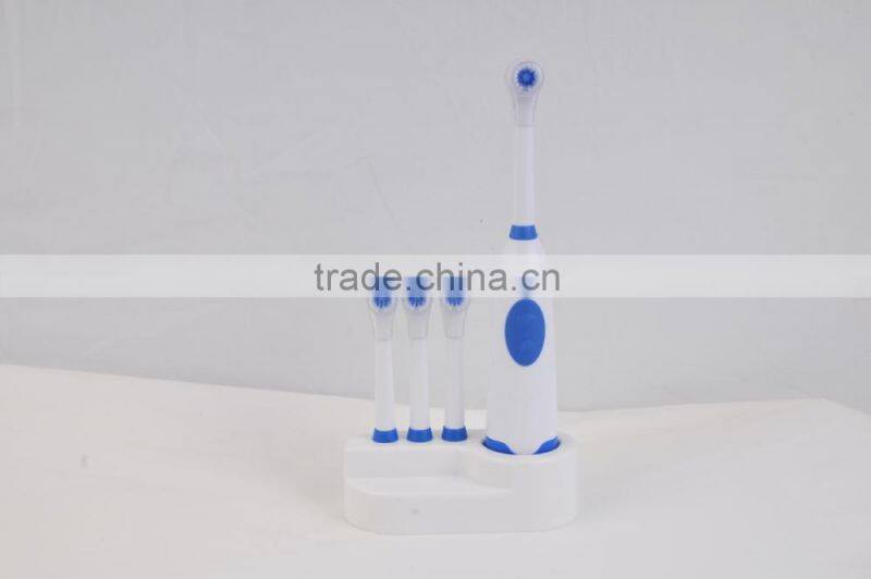 2015 kid waterproof battery powered electrical toothbrush with holder and replace head