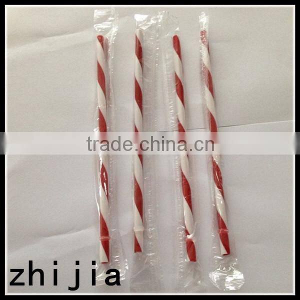 Clear wrapped red plastic drinking straw