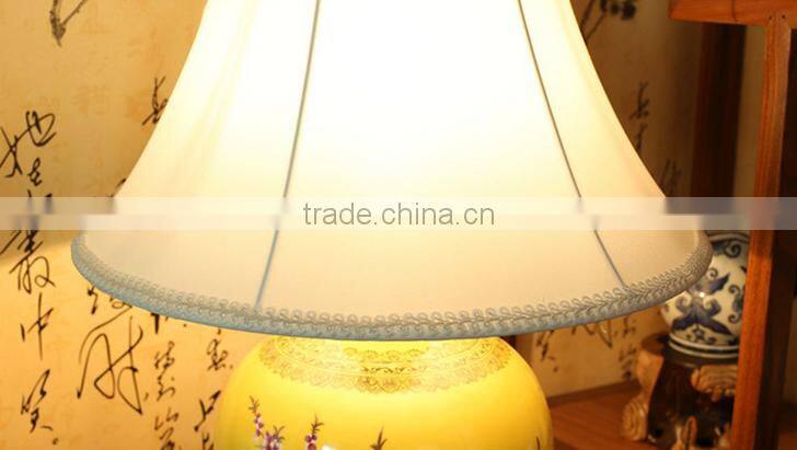 Classic chinese fabrics shadow yellow ceramic table lamp for home hotel