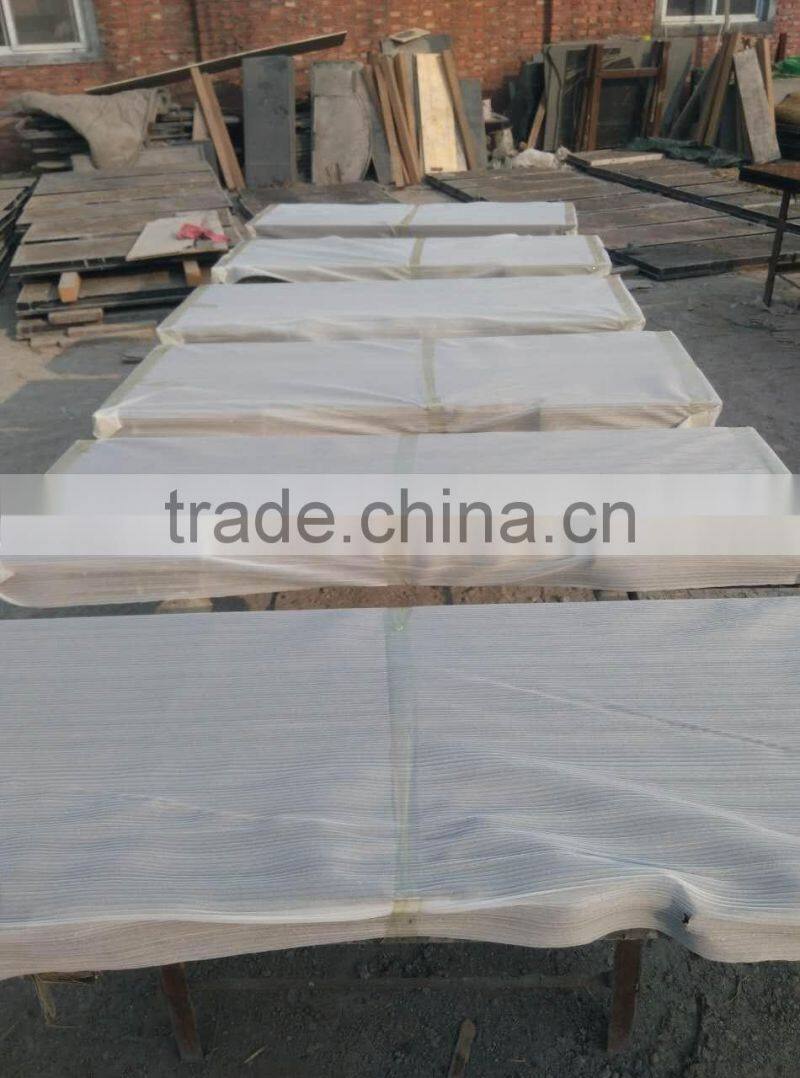 black granite hearth fireplace