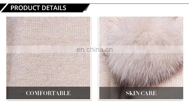 Woman black custom pullover sweater with a lot fox fur ball