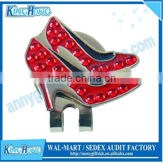 Ladies golfer ball marker with cap clip