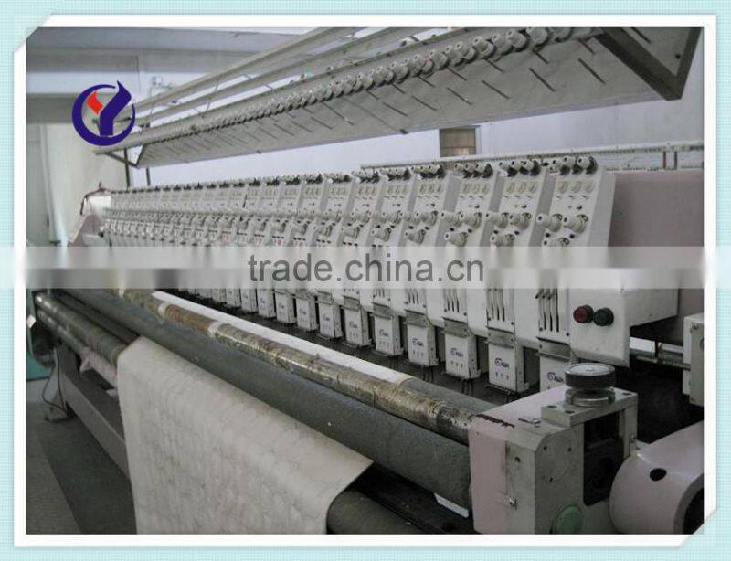 Multi needle quilting embroidery machine