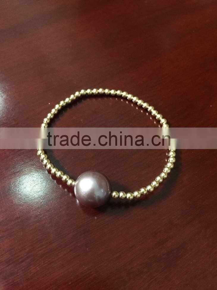 wholesale 13-14mm purple Edison pearl with gold bead bracelet