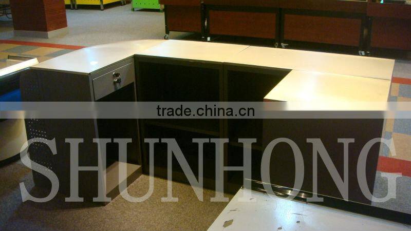 cash/bill register table with display shelf attached