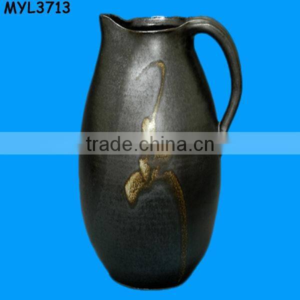 Matt artistic black pottery decanter