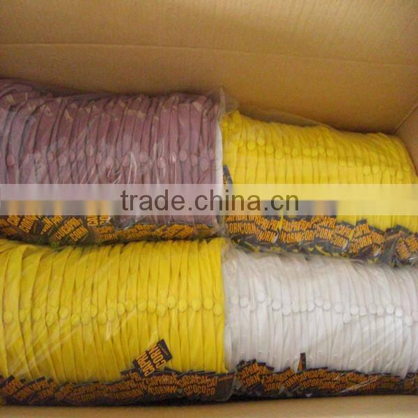 Short brim snapback hat with an adjustable plastic snapback strap closure