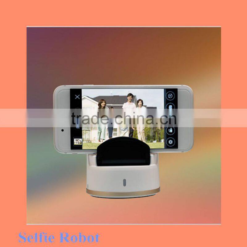 buy new trendy selfie robot directly from factory Automatic Face Recognition Tracking Mini Selfie Robot for mobile phone