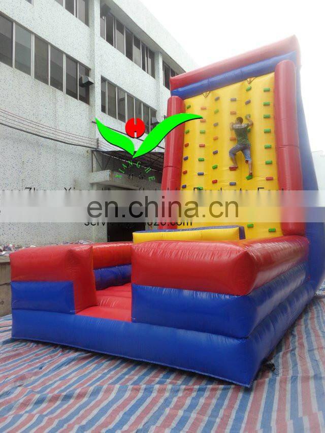 Inflatable climbing wall with obstacle course
