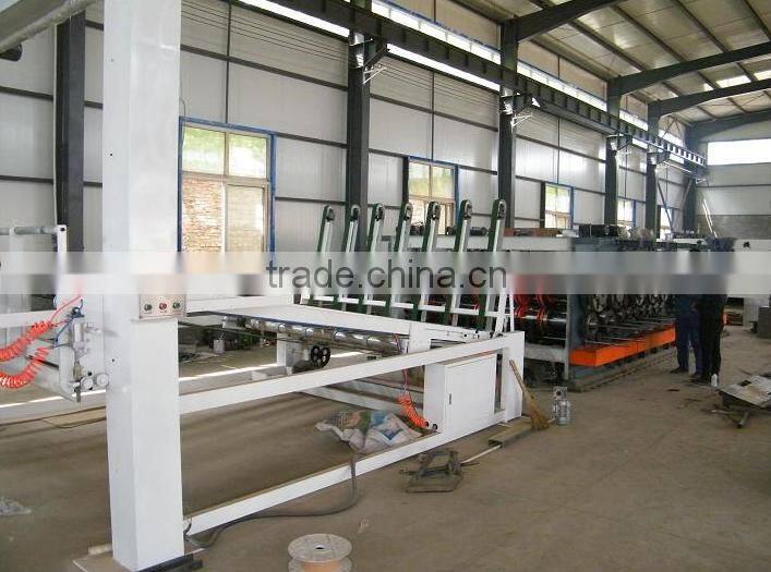 Automatic corrugated paperboard stacking machine