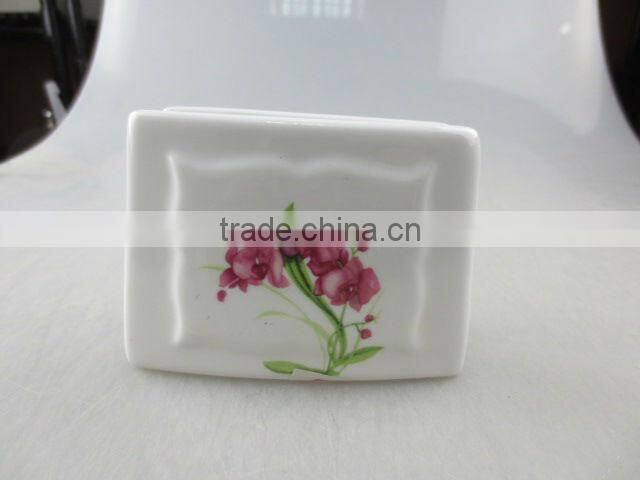 square porcelain napkin holder with flower design