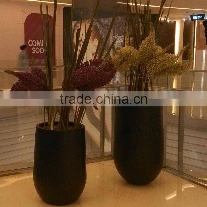 Black round fiberglass flowerpot