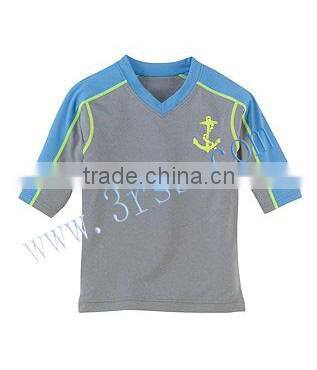 young boy's rash guard with V neck in grey