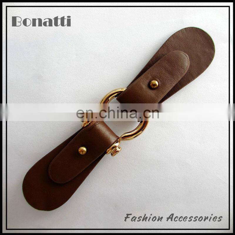 leather toggle button with golden metal buckle