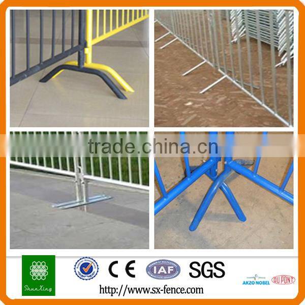 Yellow used road safety barrier, stage barrier