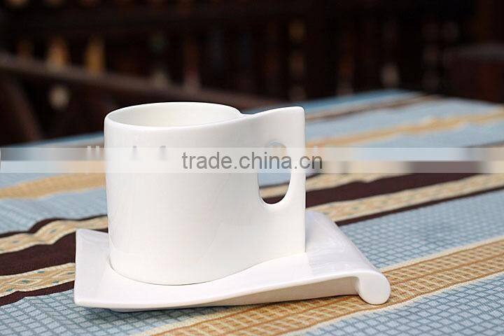 White porcelain ceramic coffee mug with saucer