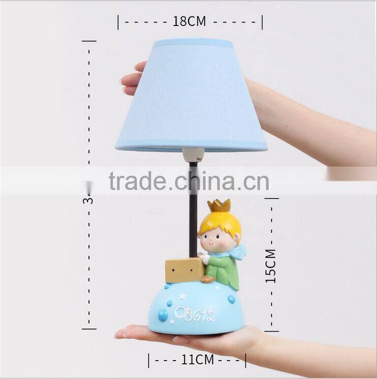 Creative cartoon children reading prince shaped resin led table lamp