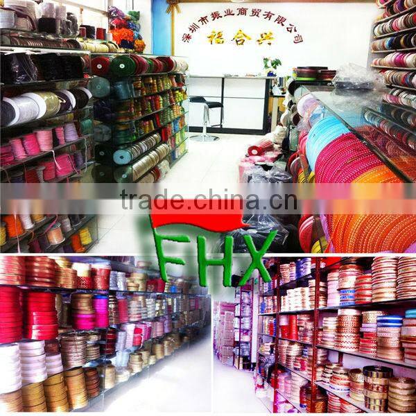 cushions embroidered with curly ribbon