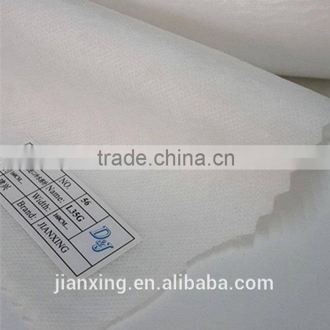 Hot and cold water soluble adhesive interlining for garment embroidery