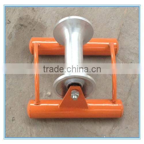 Ground cable roller, cable block