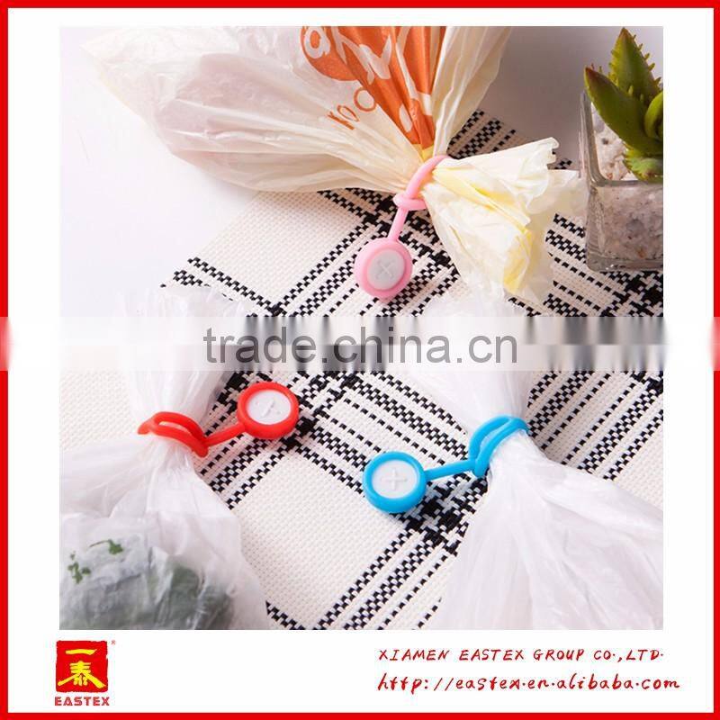 Multipurposed button silicone pothook