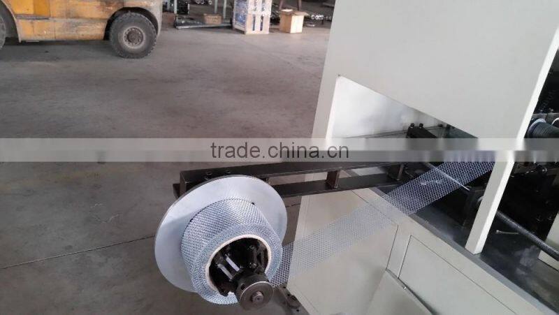 Automatic expanded metal spiral tube making machine
