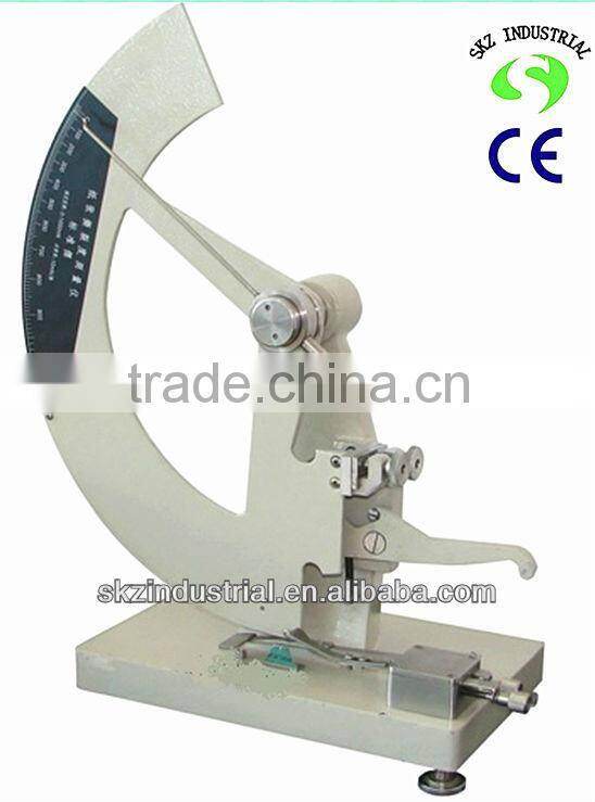 Paper and board tearing strength tester