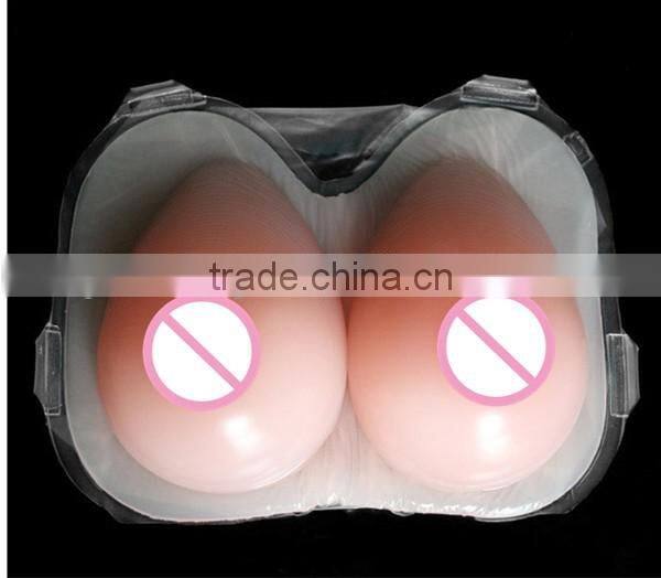 600g-2000g per pairs pink beige transparent brown color avaliable one piece silicone breast forms China Supplier good services