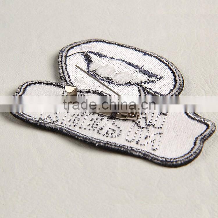 2016 China factory directly custom decorative embroidered label with overlocked for men's alpine jackets