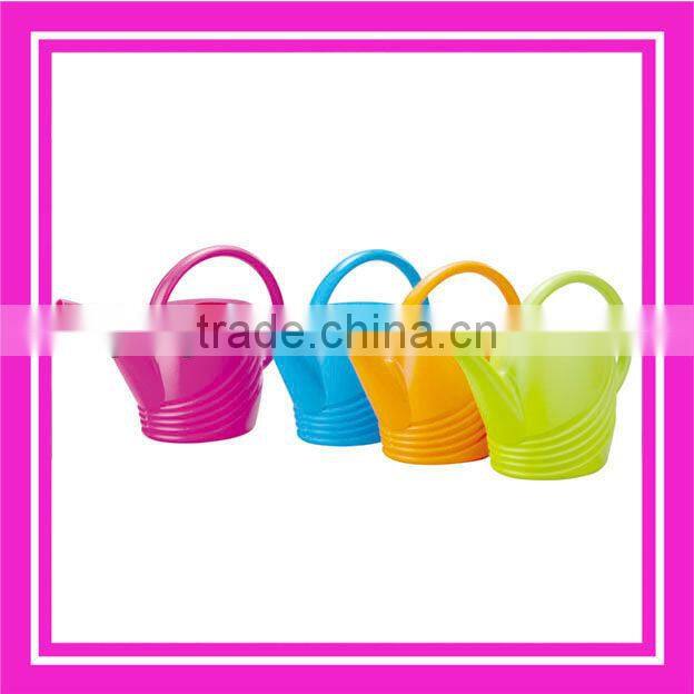 small plastic watering can