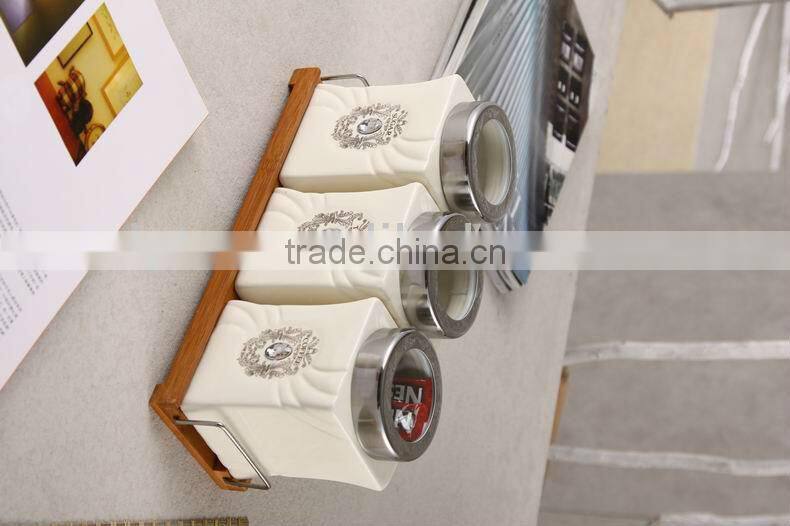ceramic canister set with stainless lid & wooden stand