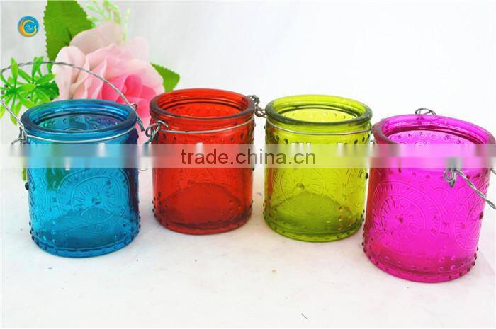 decorative wall hanging jar candle holder with black metal wiring cross pattern