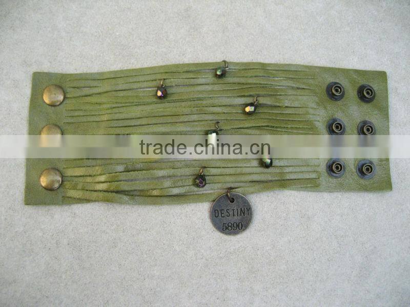 sliced leather bracelet, wide Leather Cuff - Charms Bracelet, Multi Strap Bracelet with peace and gun charms