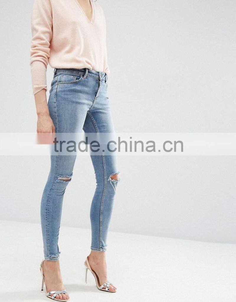 OEM service sales winter comfortable cotton jeans pent stonewash shredded knees for lady