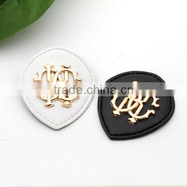 Black/white PU leather sew on patches Fashion labels with metal logo clothing label for jeans/jacket PLB-001