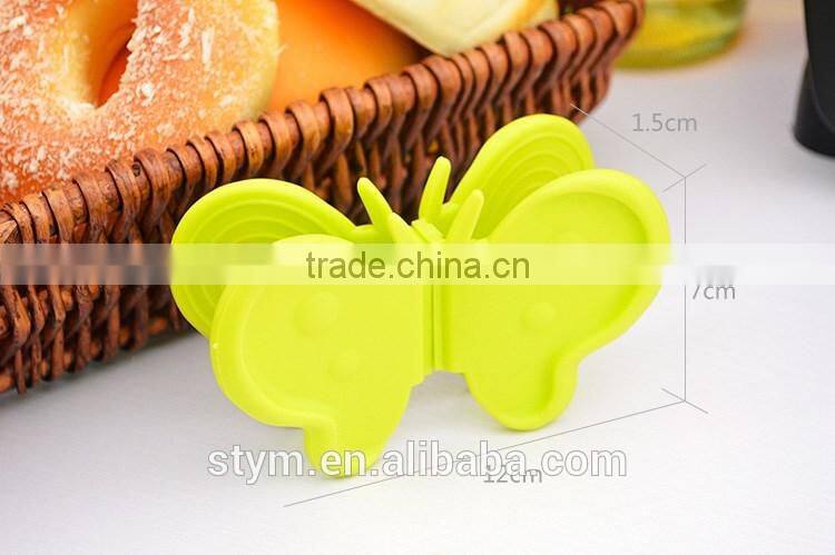 Kitchen butterfly heat insulated/resistant dish holder