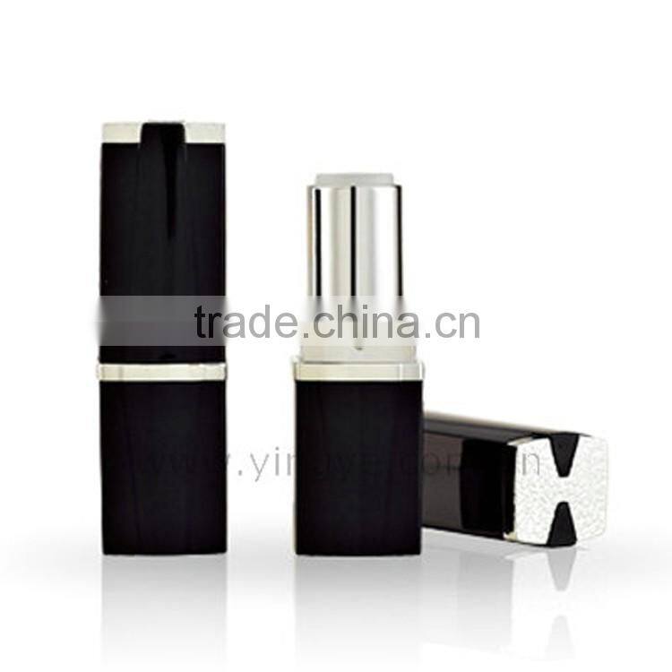 Red drop shape liquid cosmetic container with brush