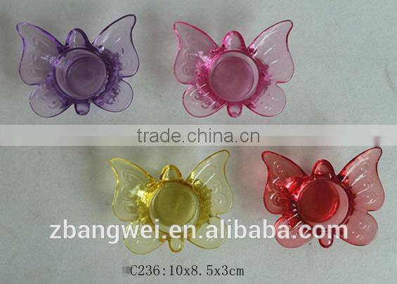 butterfly-shaped glass candle holder